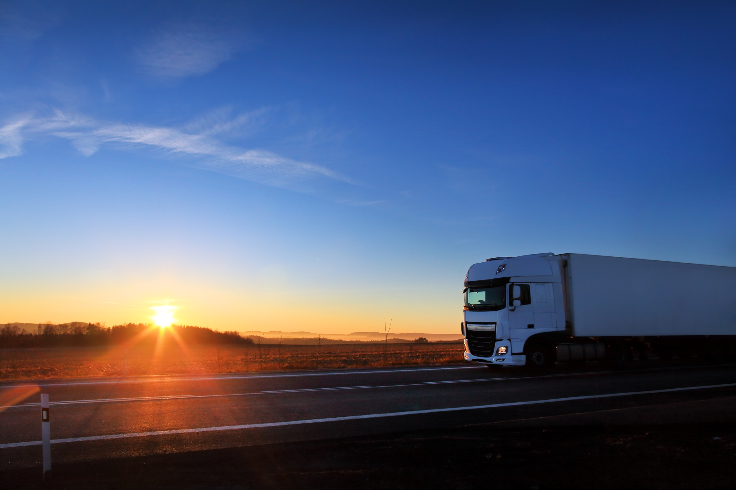 Truck transportation at sunset